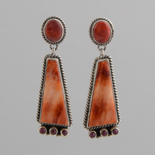 This pair of earrings features Orange Spiny Oyster Shell set in Sterling Silver.
