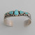 Slender sterling silver cuff with Pilot Mountain Turquoise.  Very nice silver "bubble" work with the stones.