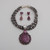 Sterling Silver with Purple Spiny Oyster Shell Pendant on Four Strands of Beads, with Dangle Earrings.  Pendant Can Be Removed From Beads.  Earrings Have Heart and Teardrop shaped Spiny Oyster Shell.  w/ Post.