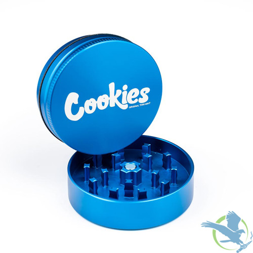 https://cdn11.bigcommerce.com/s-964anr/images/stencil/500x659/products/23861/118697/Santa-Cruz-Shredder-4-Piece-Medium-Cookies-Grinder---4-Parts---2.13-Inches-Blue-Wholesale__69871.1694626839.jpg?c=2