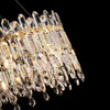 Crystals of a Chandelier with Gold Finish Lamps on