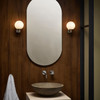 Sagara Bathroom Wall Light with Sphere Shaped Bathroom Mirror Sides Installation Dark Interior