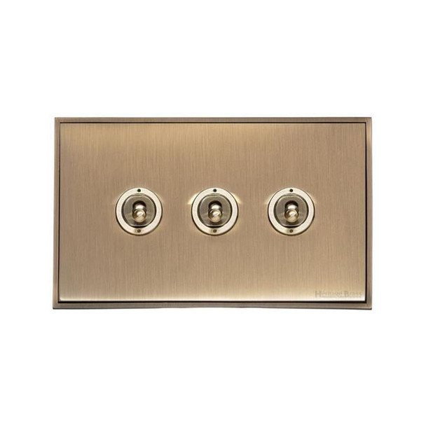 Executive Range 3 Gang Toggle Switch in Antique Brass  - Trimless