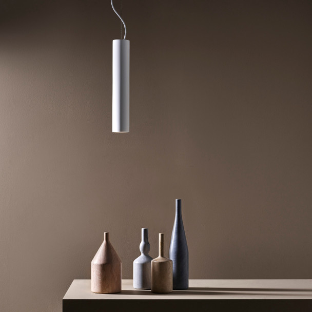 1 Cylindrical Pendant Light Over the Dining Table