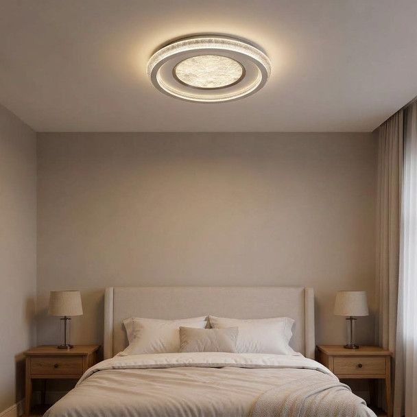 Round LED flush ceiling light 80cm in chrome, dimmable with remote, shown in a modern bedroom
