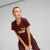 Puma Womens Essentials+ Metallic Logo Tee Aubergine/Gold Puma Womens Essentials+ Metallic Logo Tee Aubergine/Gold