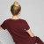 Puma Womens Essentials+ Metallic Logo Tee Aubergine/Gold Puma Womens Essentials+ Metallic Logo Tee Aubergine/Gold