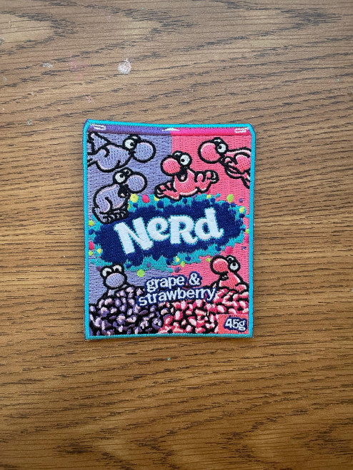 Nerd - Fingerless Joe Iron On Embroidered Patch