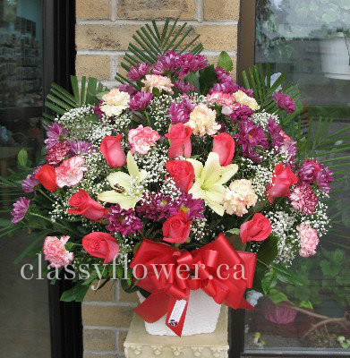 Medium size sympathy flower arrangement 