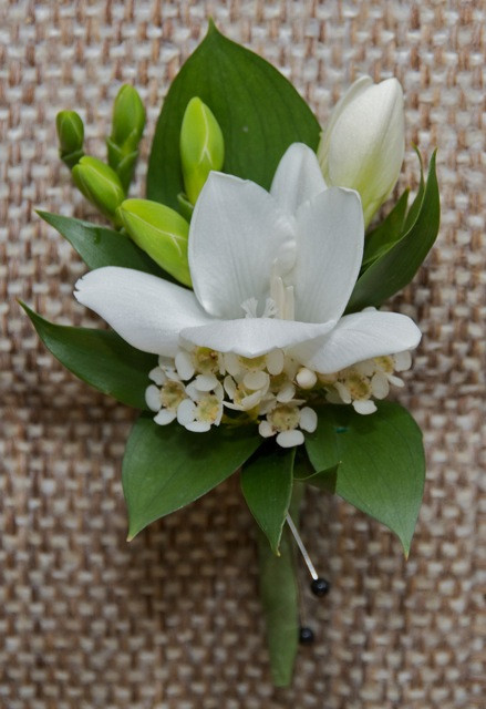 White Fresia Boutonniere 