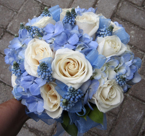 bridal bouquet blue hydrangea and ivory roses