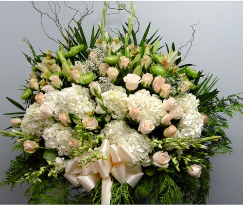Garden Basket Sympathy Arrangement With Pastel Flowers