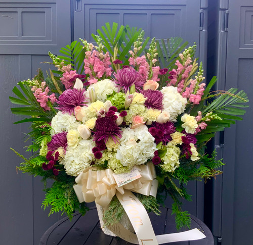 “In Loving  Memory” Arrangement With White And Purple Flowers