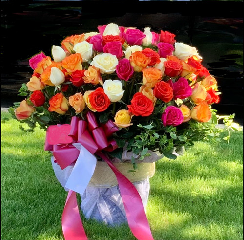75 Fresh Cut Assorted Roses In A Pot. 
