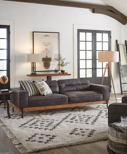 World Interiors - Chiavari Antique Ebony Leather Sofa