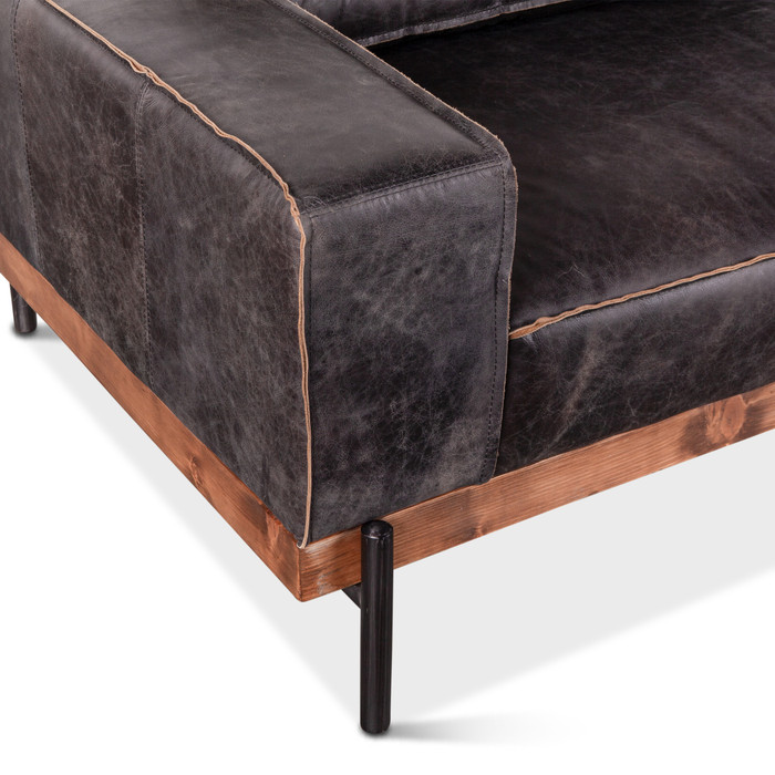 World Interiors - Chiavari Antique Ebony Leather Sofa