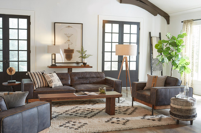 World Interiors - Chiavari Antique Ebony Leather Sofa