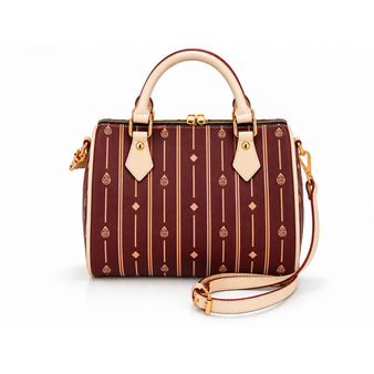 The Flori™ Mini Grand Pebble captures the signature proportions and polished details of the  Flori™ Grand in a compact, easy-to-carry silhouette—designed for effortless day-to-evening style.
