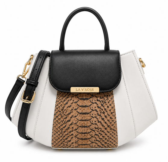 The Vipera Python Satchel features a sculptural, polished silhouette accented with a luxurious cork leather python-inspired embossed center paneling.