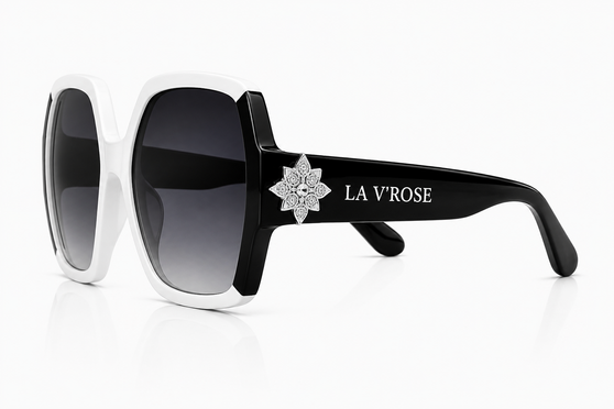The Flori Star Gazer oversized sunglasses in white creates a subtle interplay of depth, sparkle, and vintage-inspired glamour.