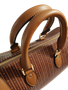 Rich, sculpted, and undeniably sophisticated—the Bordeaux Flori™ Grand Boston-style bag brings depth and quiet luxury to any look. Its deep wine hue enhances the signature pattern, creating a statement that feels bold yet timeless.