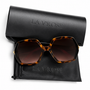 The Flori Star Gazer oversized sunglasses in Havana tortoiseshell creates a subtle interplay of depth, sparkle, and vintage-inspired glamour.