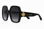 The Flori Star Gazer oversized sunglasses in noir creates a subtle interplay of depth, sparkle, and vintage-inspired glamour.