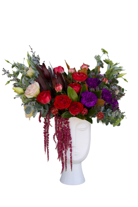 Seasonal flowers in a ceramic face vase - FREE DELIVERY 