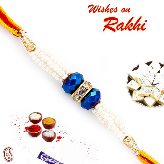 White Pearl with blue beads and American Diamond ring Rakhi - PRL17536