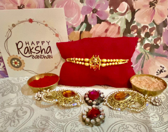 Red Trishul Rakhi - Dubai Delivery