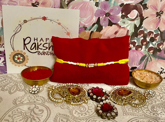 Yellow crystal rakhi - Dubai Delivery