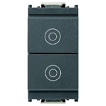 A dark grey Idea Double 1P NO 10A Push Button switch. to and bottom separated. Bullseye symbol on top and bottom. On a white background A dark grey Idea Double 1P NO 10A Push Button switch. to and bottom separated. Bullseye symbol on top and bottom. On a white background