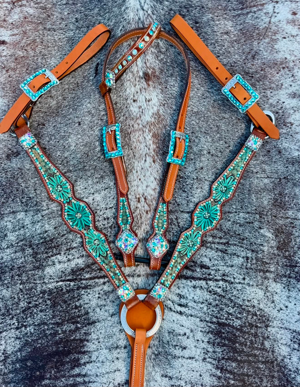 Hand tooled and painted tan leather western tack set with a desert flower design