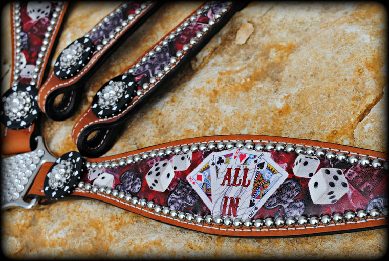 Close up of breast collar showing cards, dice, and smoke design.