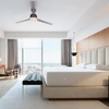 Hybrid encasement on a made hotel bed