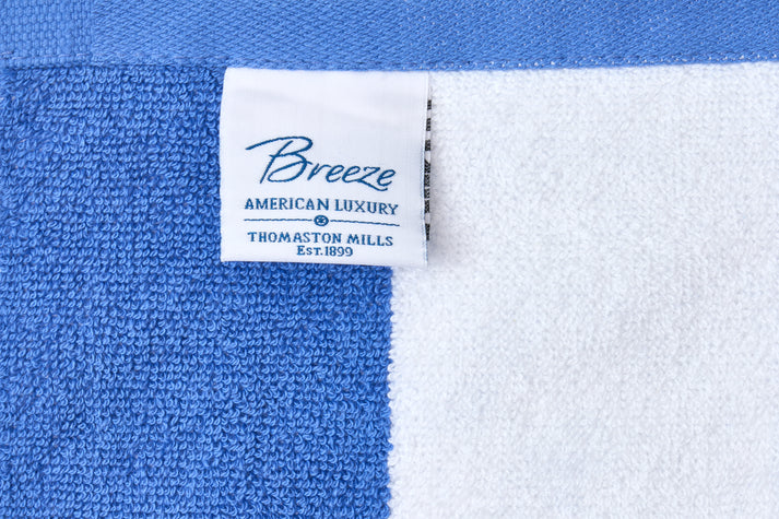 Thomaston Mills American Luxury Breeze pool towels in Ultramarine Blue / White and Ultimate Gray / White cabana stripes