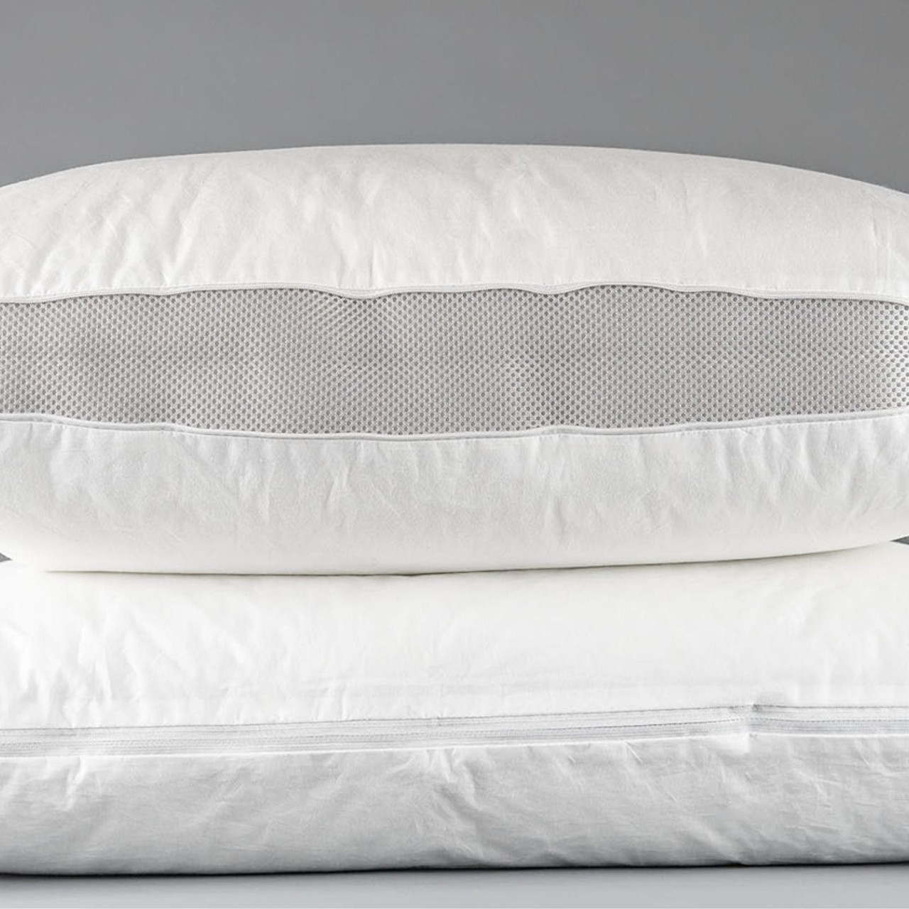Representative Martex Flex Micro Cluster pillow photo showing the adjustable gusset. Image is shared across sizes. See this listing for size and case quantity; the number of pillows pictured does not indicate case quantity.