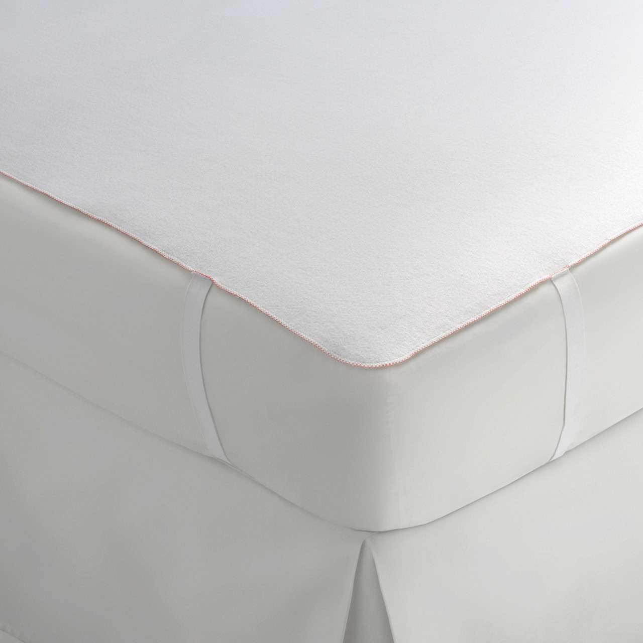 Representative Tough One anchor-band mattress pad photo showing the corner bands. Mattress and bedskirt are not included. Photo is shared across sizes; see this listing for size and case quantity.