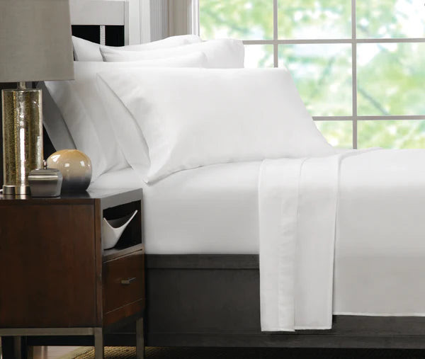 Representative Ultra Touch collection photo. Pillowcases only are sold here; sheets, pillows and furniture are excluded. Current pictured hems may differ from the listed 2-inch hem. See listing for size and case quantity.