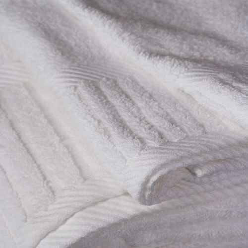Luxurious white hotel towel with a sophisticated Piano Design Dobby Border by Ganesh Mills
