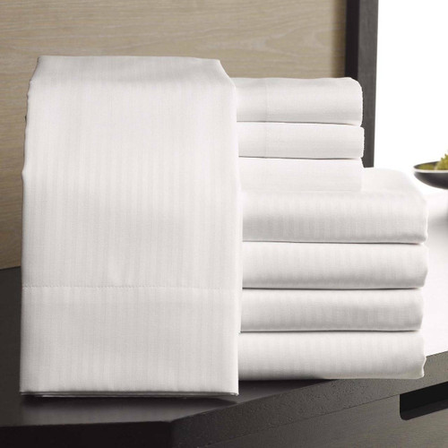 Martex Patrician T250 Bedding - Elegant white bedding with a 5/32'' twill weave stripe. Crafted from 60% cotton and 40% polyester, perfect for commercial use. Ideal for upgrading hotel comfort and style.