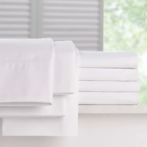 Fresh White T200 fitted sheet. Representative supplier collection image; sheet only. Other bedding and pillow inserts not included.