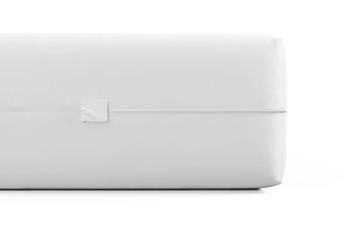 Side view, encasement fully wrapping a mattress in breathable knit fabric