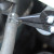 Long Nose Side Cutter Parallel Plier in use during auto repair