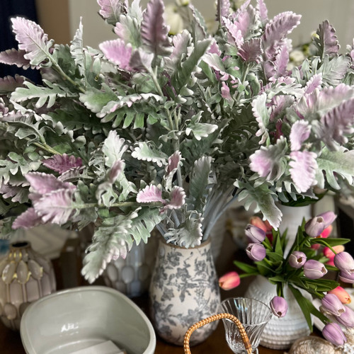 Dusty miller greenery stem styled in decorative vase for home decor