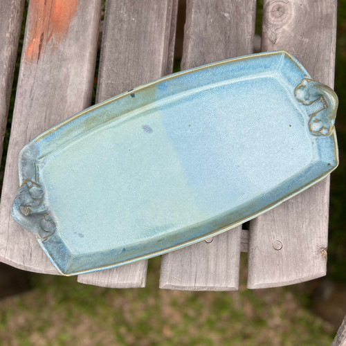 Ceramic rectangular serving platter in rich blue glaze with side handles