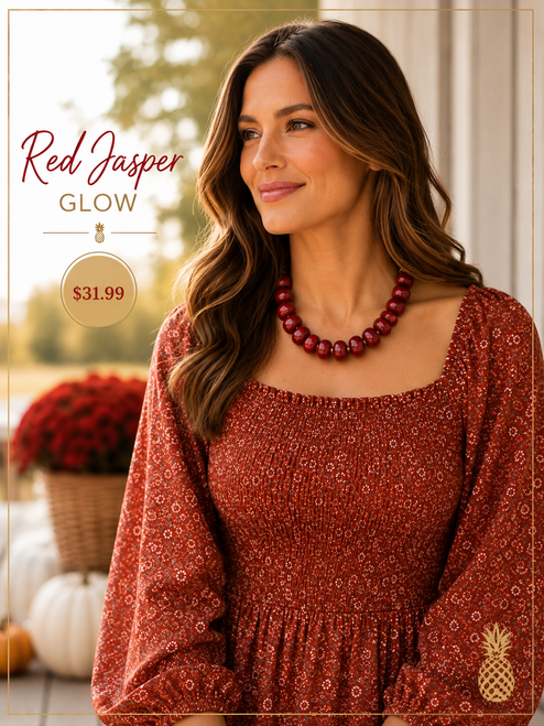 Red Jasper Glow chunky resin and natural stone bead statement necklace with 18K gold-plated hardware on brunette wearing a fall dress