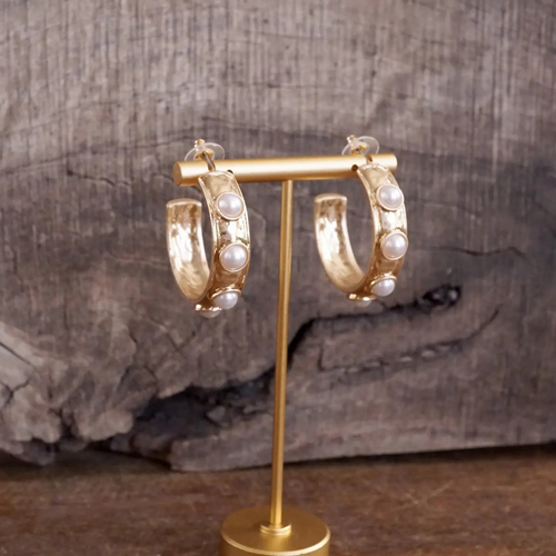 Gold bubble hoop earrings featuring colorful acrylic cabochon jewels