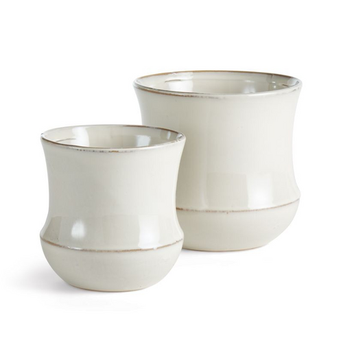 What makes these pots unique is the deep, aqueous glaze. Made of a high-fired stoneware, the rich depth of color is on full display.Use as cachepot or plant directly into. Protect fine furniture by lining interior of pot. Protect from frost and hard freeze. -Cream; -Items have drain holes
Dimensions: 7 x 7 x 6.5;5.5 x 5.5 x 5.5