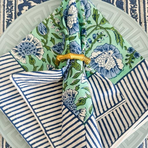 Capers Napkins in blue and green floral white striped blue and white border